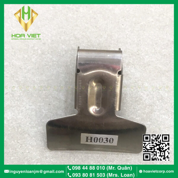 Đè giấy tay kê trước máy 74